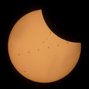 The International Space Station is seen in this composite photo transiting the sun during the eclipse.